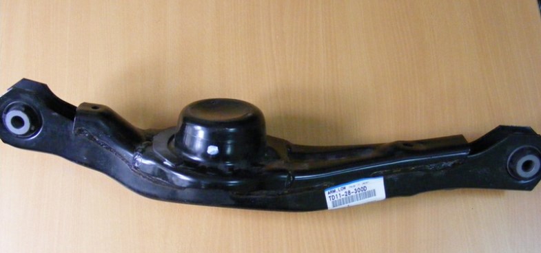 Mazda TD11-28-300D Рычаг задний нижний поперечный TD1128300D: Отличная цена - Купить в Украине на EXIST.UA! TD1128300D Mazda Рычаг задний нижний поперечный