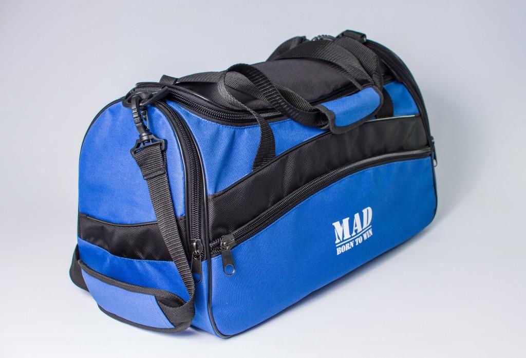 MAD | born to win™ Середня спортивна сумка каркасної форми TWIST синя – ціна 1260 UAH